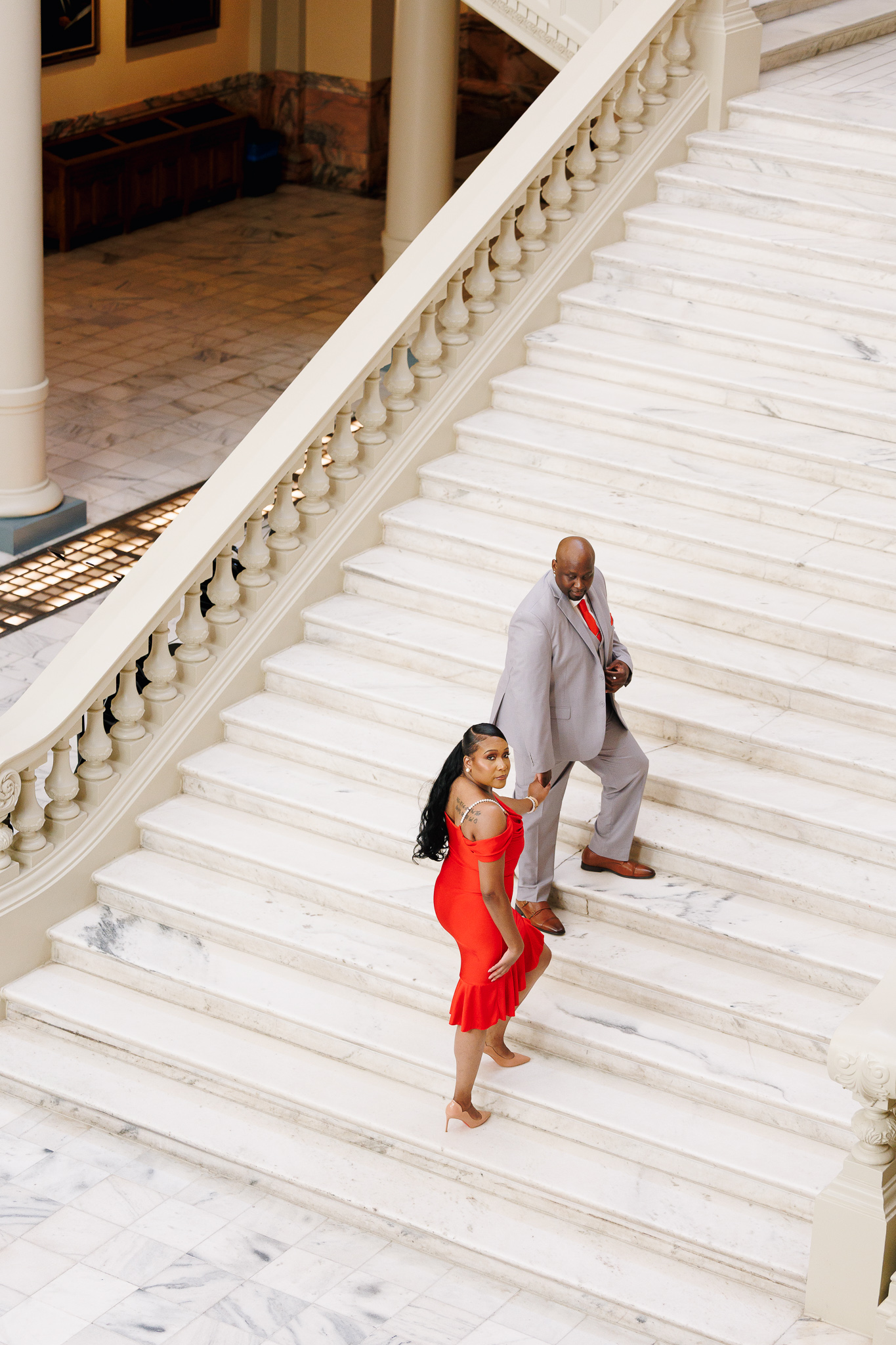 Couple during engagement session at the Georgia State Capitol in Atlanta, photographed by B. Smitty Photos