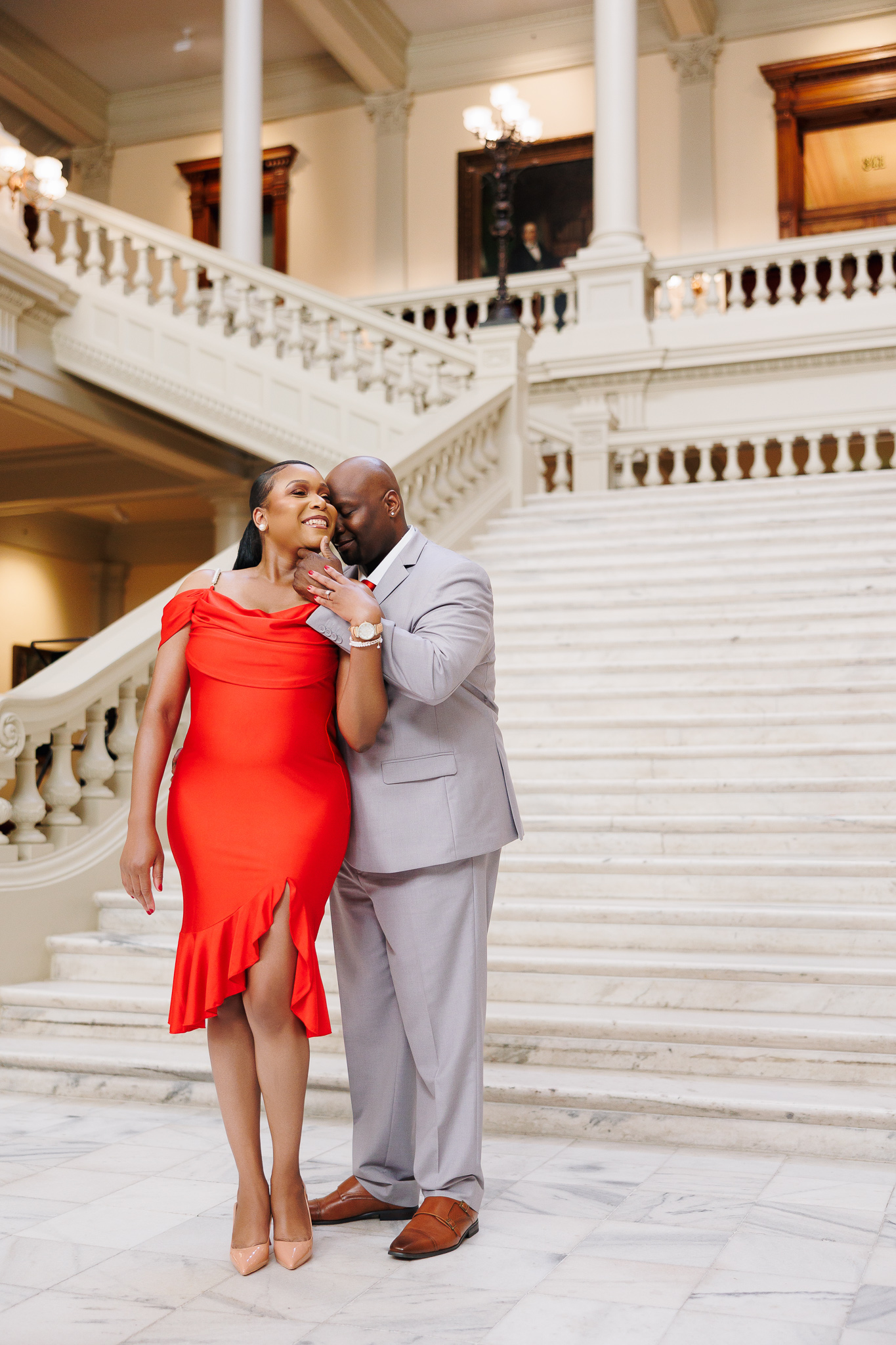 Couple during engagement session at the Georgia State Capitol in Atlanta, photographed by B. Smitty Photos