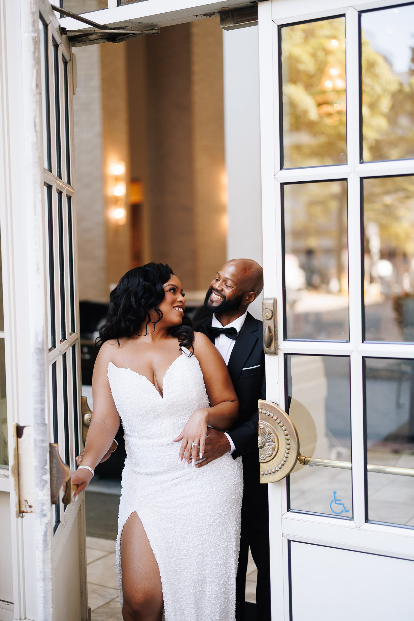 Couple during engagement session at The Georgian Terrace hotel in Atlanta, photographed by B. Smitty Photos