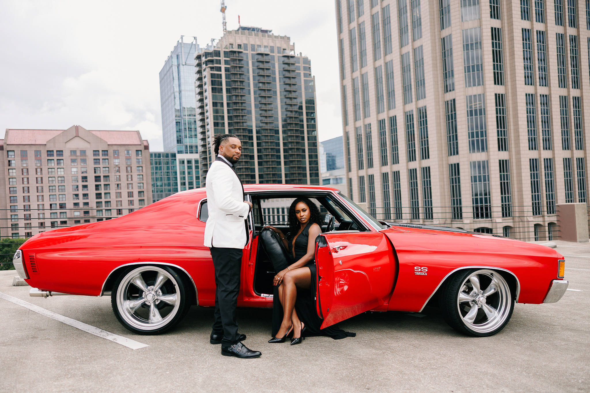 Couple during engagement session with Atlanta skyline views, photographed by B. Smitty Photos