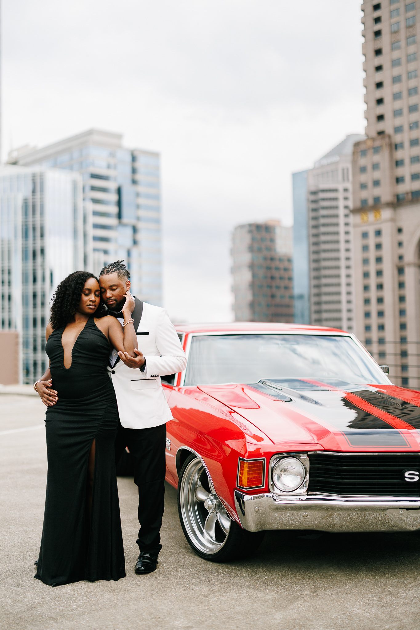 Couple during engagement session with Atlanta skyline views, photographed by B. Smitty Photos