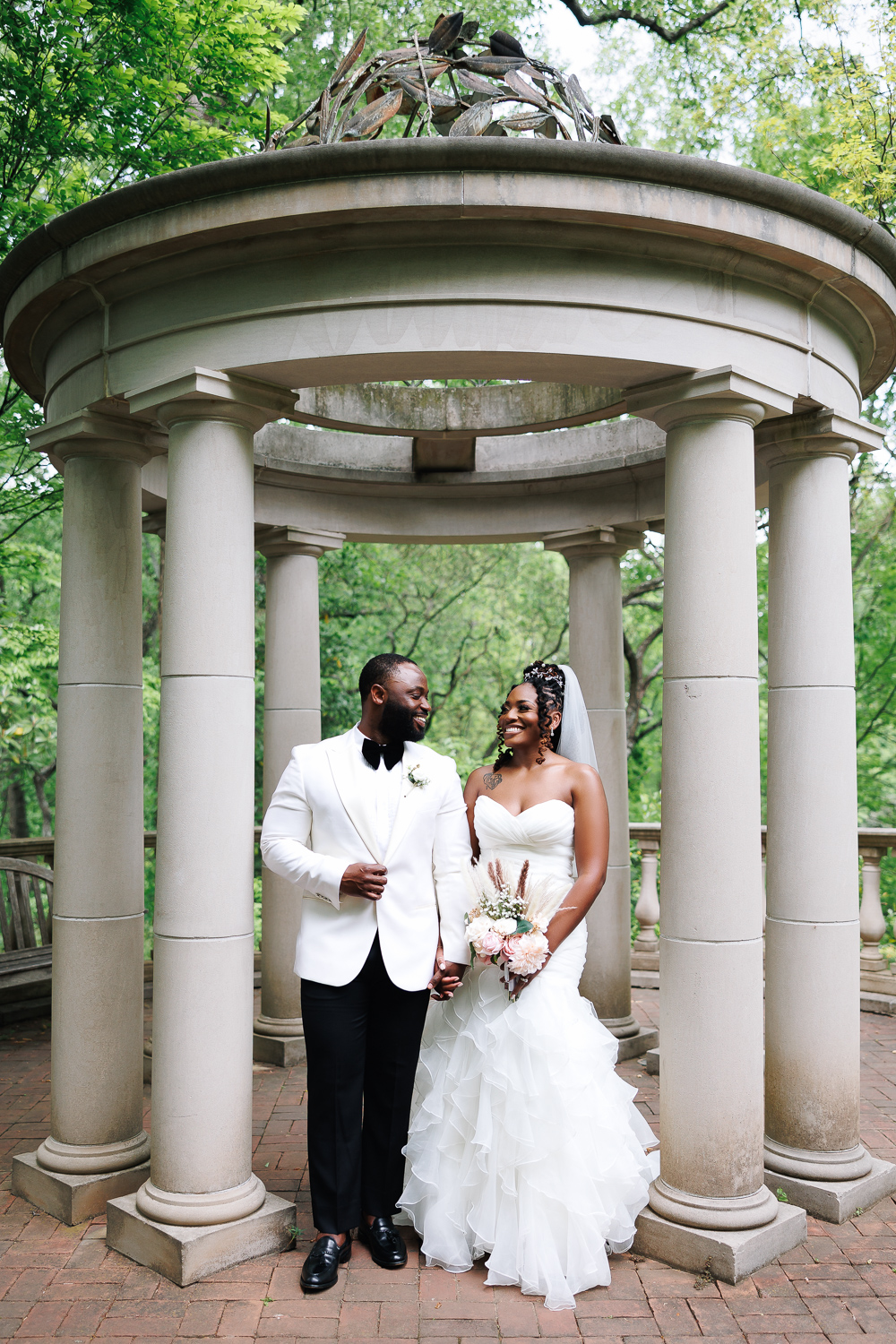 Couple during wedding at the Atlanta Botanical Garden, photographed by B. Smitty Photos