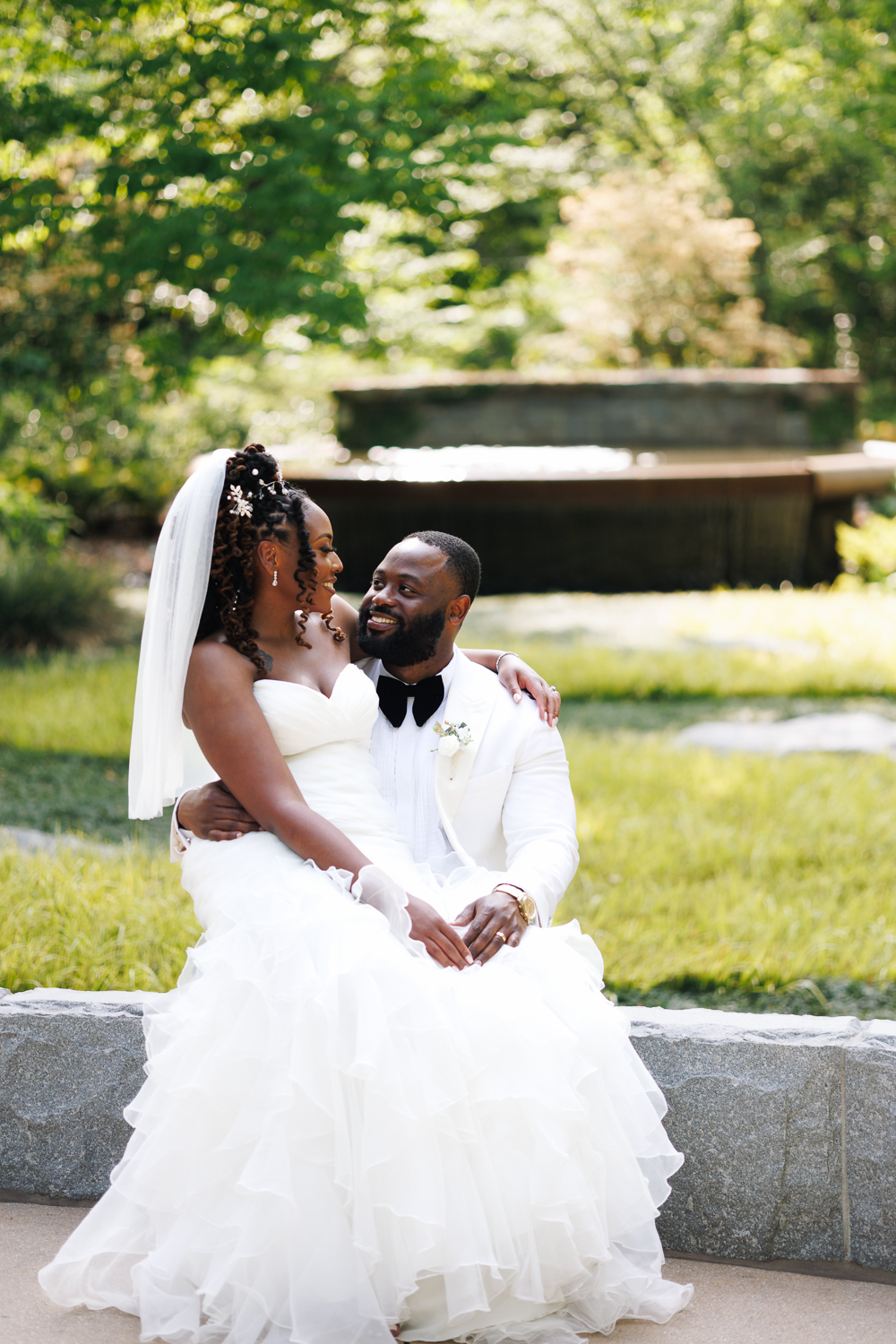Couple during wedding at the Atlanta Botanical Garden, photographed by B. Smitty Photos